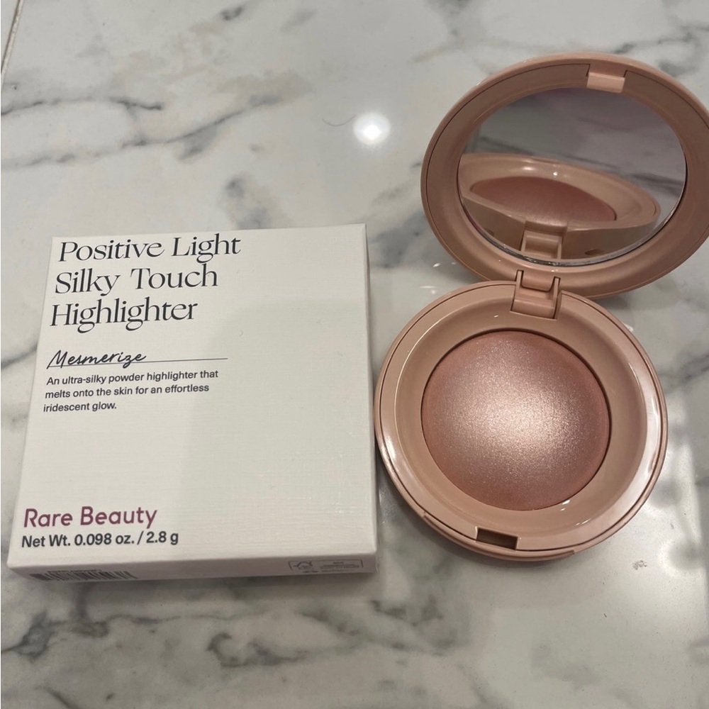 Rare beauty positive light silky touch highlighter in Mesmerize.
